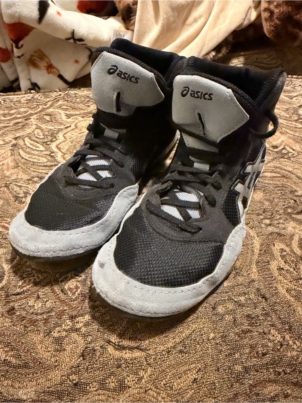 Asics woman’s and men’s Black and Gray High-Top Sneakers